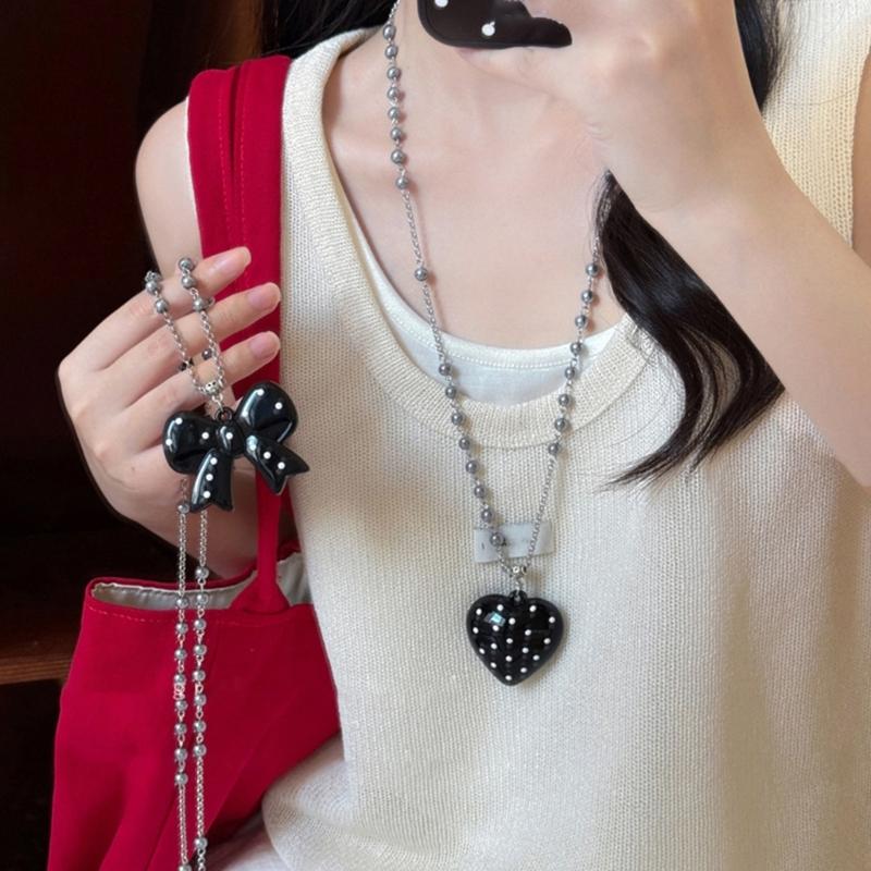 Stylish Long Beaded Necklace Featuring Black Round Dots And Bowknot Love Charm For Casual or Party Wear