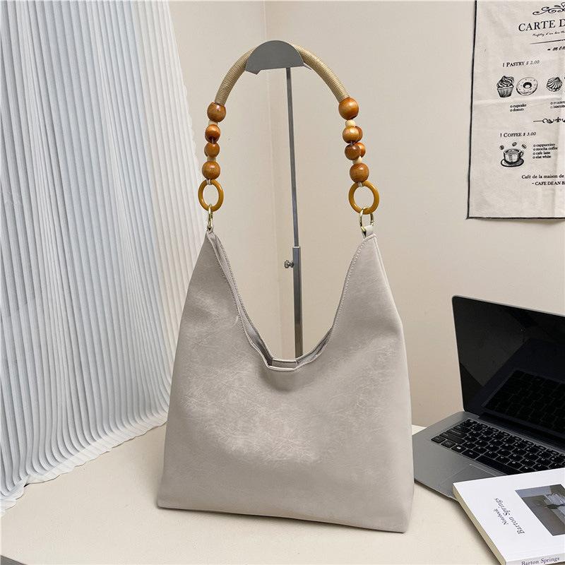 

Вместительная однотонная сумка через плечо 2025 новая простая осенняя текстура повседневная сумка для работы ретро сумка женская бежевый