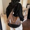 Soft PU Hobo Bag with Slouchy Design and Adjustable Strap Ideal for Everyday Use and Casual Outfits