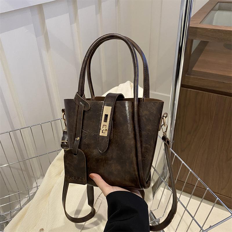 Fashionable Hand-held Bucket Bag for Women's Spring New Niche Design and Fashion Trendy Crossbody Bag