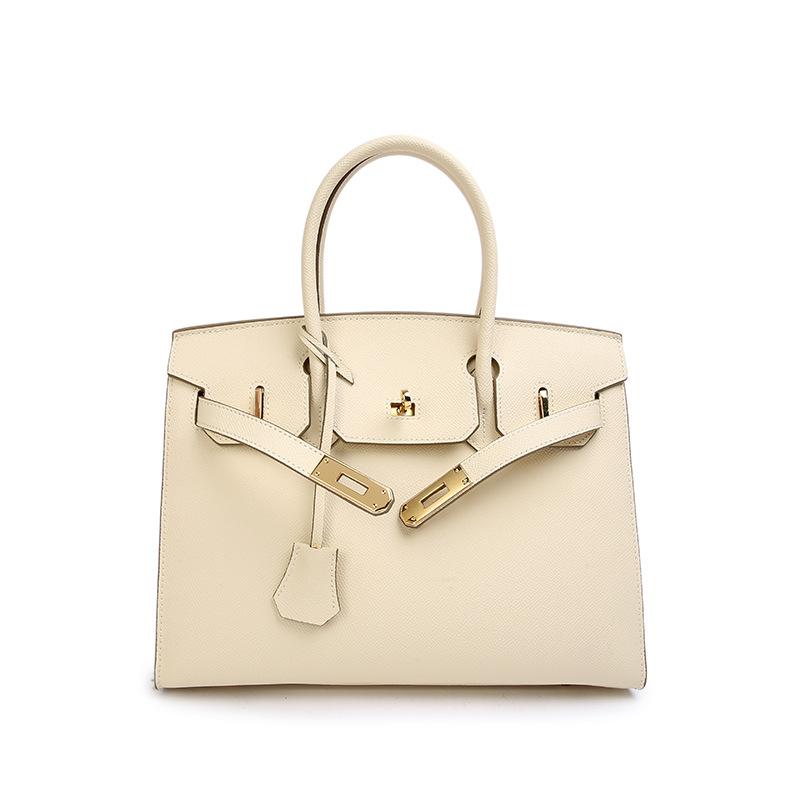 Grenzüberschreitende Explosive EP Handheld Rindsleder Außenriemen Hardware Tasche Hochwertiges Zeitgefühl Echtes Leder Damentasche Mehrstil Handtasche