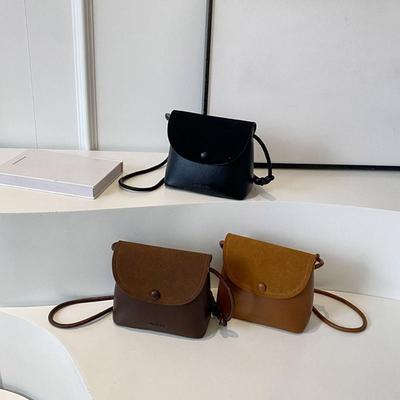 Retro jednobarevná PU kůže Malá taška přes rameno Podzimní a zimní Dámská nová kbelíková crossbody taška KTY