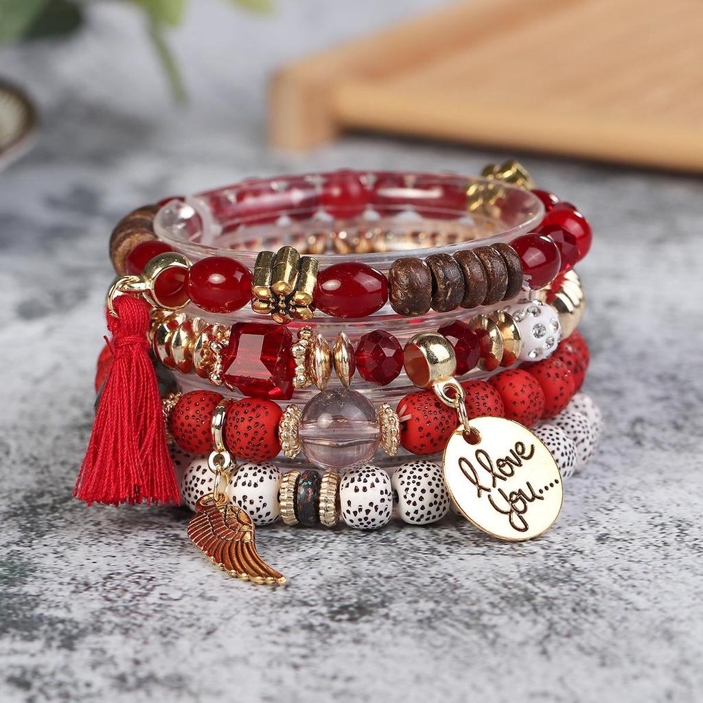 Bohemian Trendy Bracelet with Wings, 'I Love You' Tassel Pendant, and Retro Creative Design