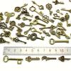 100-delars vintage nyckelhängen - olika antika bronsmetallhängen, utsökt designade, lämpliga för gör-det-själv-smyckestillverkning och bröllopsfestpresenter