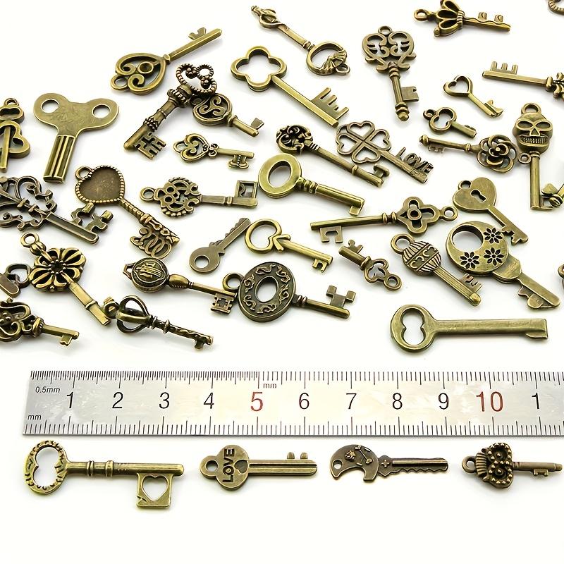 100-delars vintage nyckelhängen - olika antika bronsmetallhängen, utsökt designade, lämpliga för gör-det-själv-smyckestillverkning och bröllopsfestpresenter