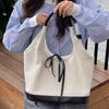 Retro commuter niche design bow shoulder underarm bag new fashion simple contrasting color tote bag