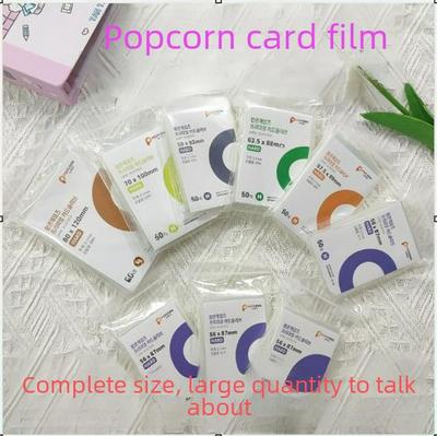 Highly Transparent CPP Card Film for 3-inch and 6-inch Cards In a Polaroid Album with Popcorn Theme.