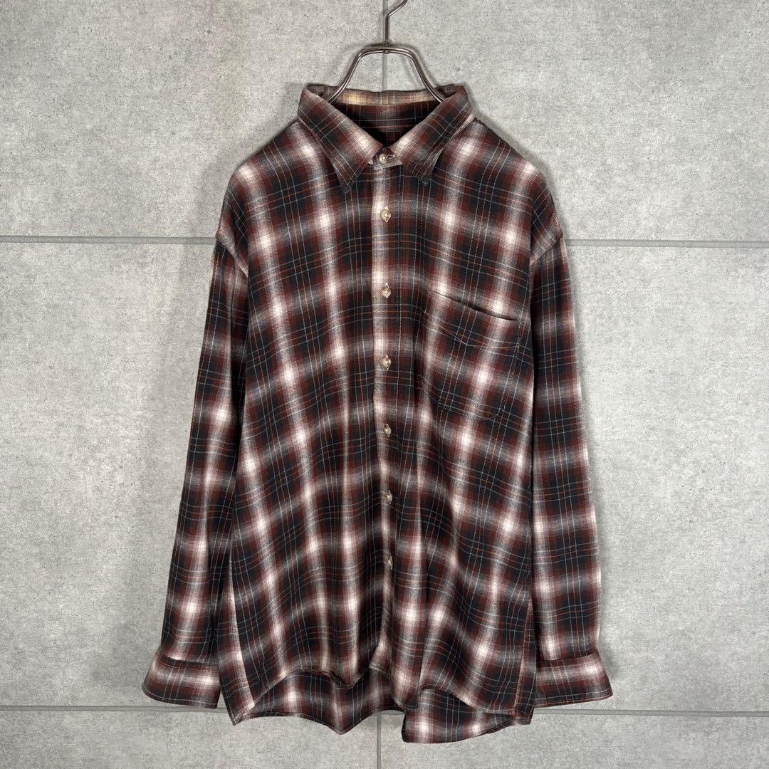 

[USED] Vintage 90s long-sleeved flannel shirt with a subtle shading in brown and black.