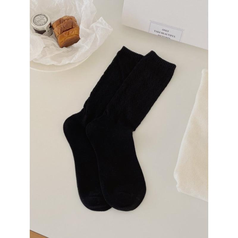 This Spring and Autumn Collection Features Solid-color Hollowed-out Mesh Pile Socks, Mid-calf Socks That Slimmer Legs, and Retro Style Socks
