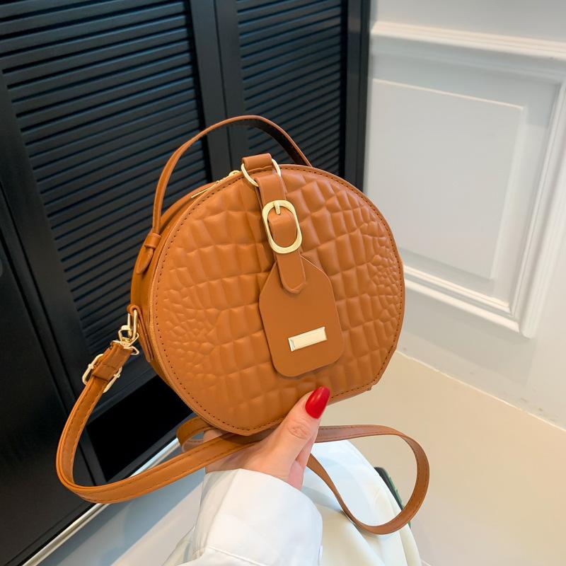 

Женская круглая сумка-торт, чувство дизайна, текстура под крокодила, ручная сумка, модная наплечная сумка-мессенджер, повседневная осенняя новинка светло-коричневого