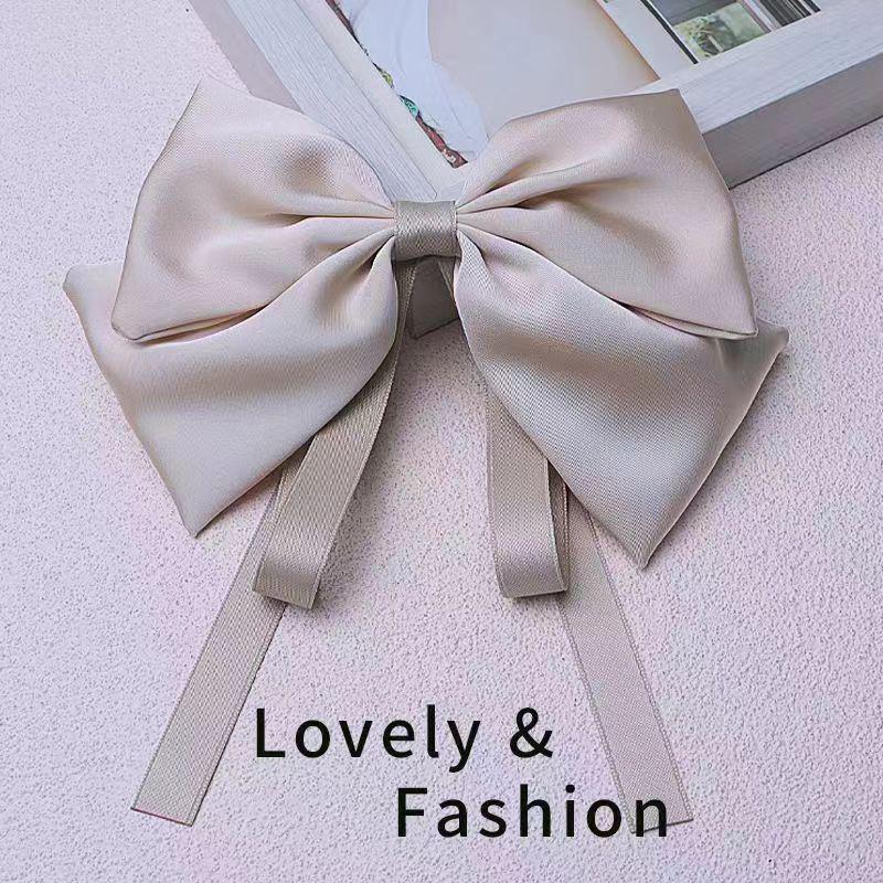 

Корейская атласная розовая заколка-бантик - детский головной убор с пружинным зажимом