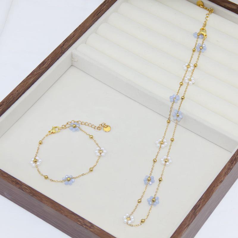 Elegant 18K Gold Beaded Necklace & Flower Bracelet in Titanium Steel