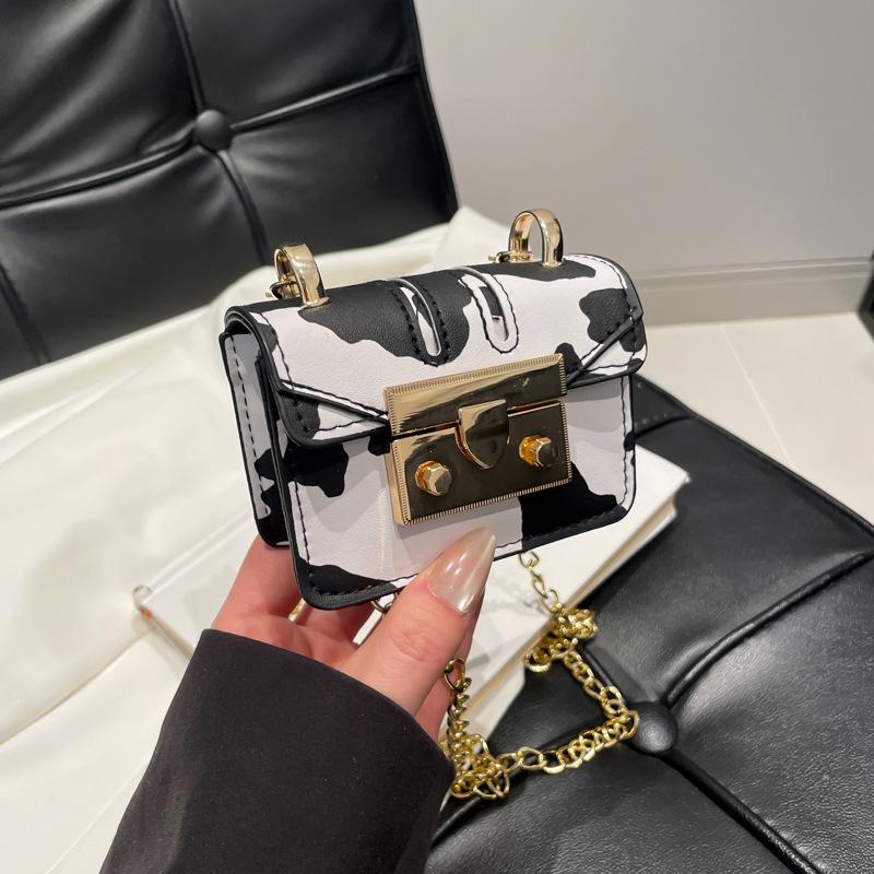 

Глянцевая мини-сумка для наушников, зарубежная сумка на цепочке, женская нишевая сумка для помады, новая милая и крутая мини-сумка-мессенджер Spice Girl.