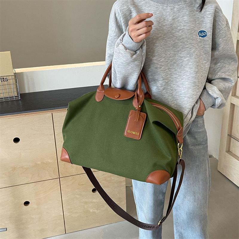 Travel bag Women's large capacity fashion lightweight short-haul luggage bag Portable outdoor portable fitness bag Birth storage bag
