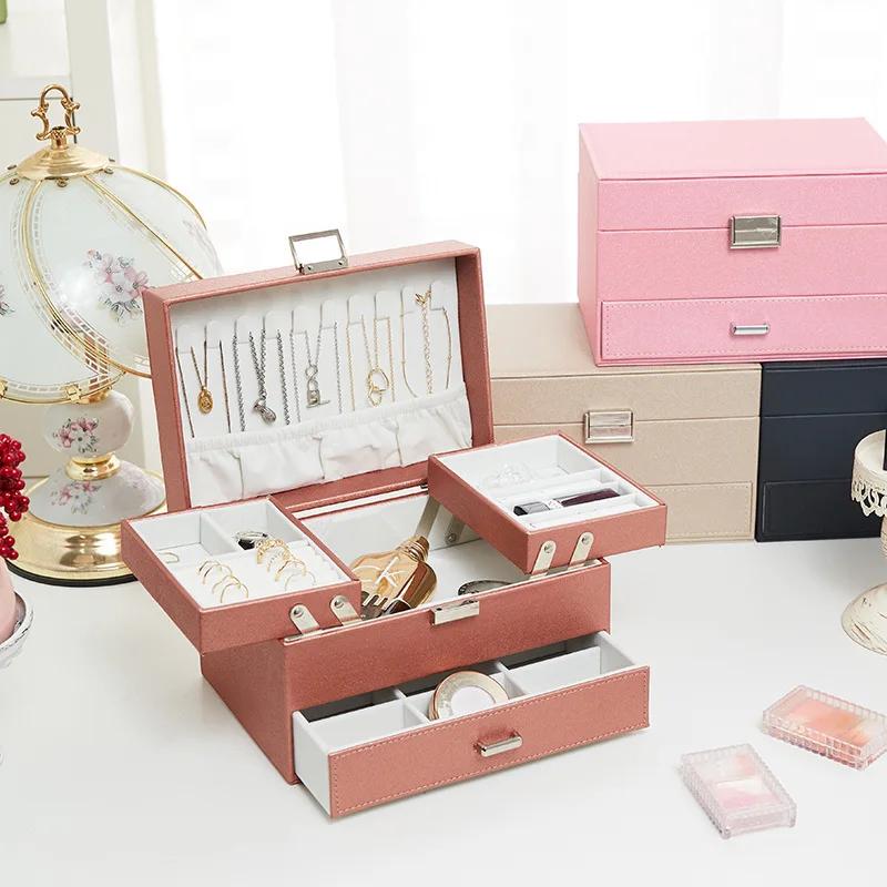 Handgehaltene Schmuckschatulle mit drei Schubladen, Aufbewahrungsbox für Ohrringe, Ringe und Halsketten, Schmuckvitrine aus PU-Leder mit Sicherheitsschlüsselschloss