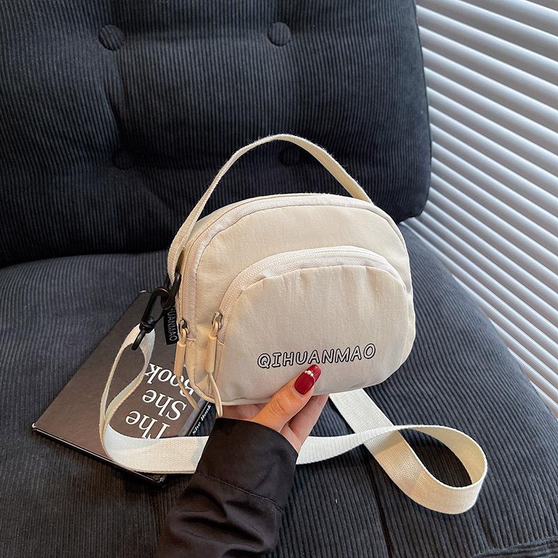 Internet celebrity texture small bag women's bag new 2025 summer foreign style canvas bag women's mini versatile shoulder crossbody bag