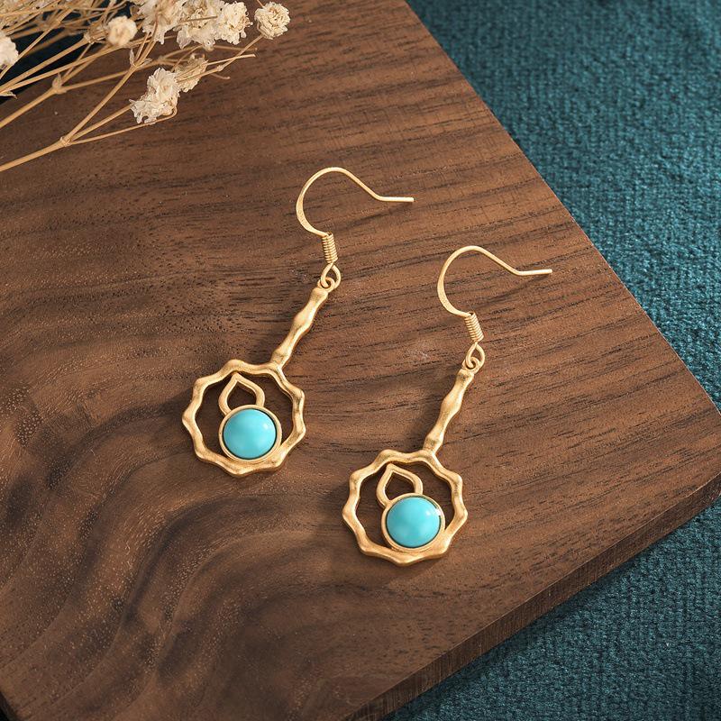 

Elegant Bamboo Gourd-Shaped Turquoise Tassel Earrings for a Slimming Round Face Look