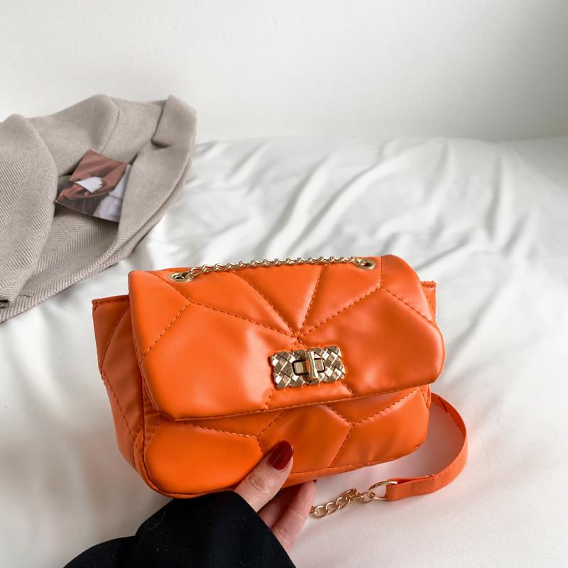 Modische kleine orangefarbene Umhängetasche für Damen mit einzigartiger gesteppter Naht
