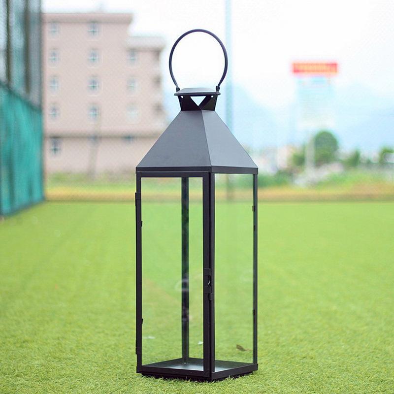 European-Style Wrought Iron Windproof Lanterns - Floor-Standing & Handheld Candlestick Ornaments for Weddings and Courtyard Decoration.