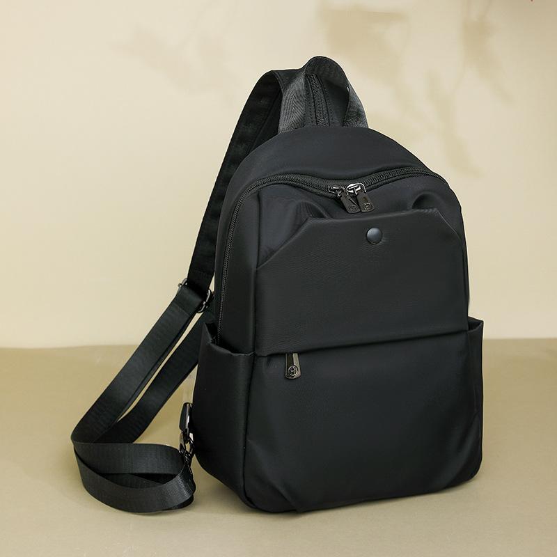 Schoolbag backpack women's new casual lightweight large-capacity schoolbag versatile trend Korean version of premium commuter backpack