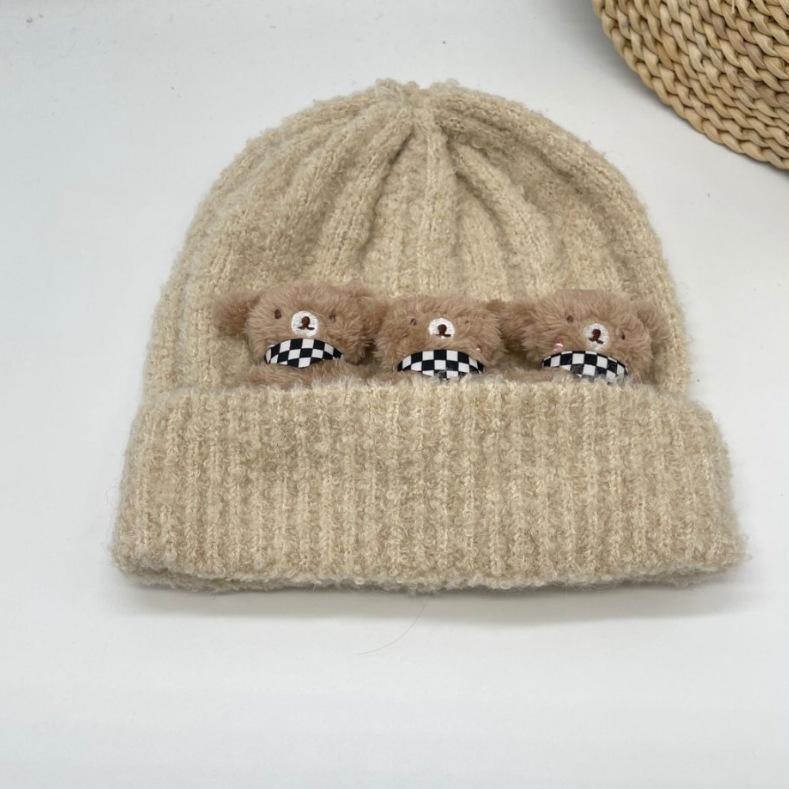 

2025 cute cartoon bear doll knitted wool hat for children to keep warm and show their faces small wool hat one size бежевий