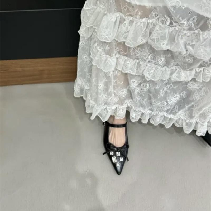 Xiaoxiangfeng bow rhinestone bag head half slippers female outer wear 2025 spring and summer with skirt slope heel fairy cool slippers