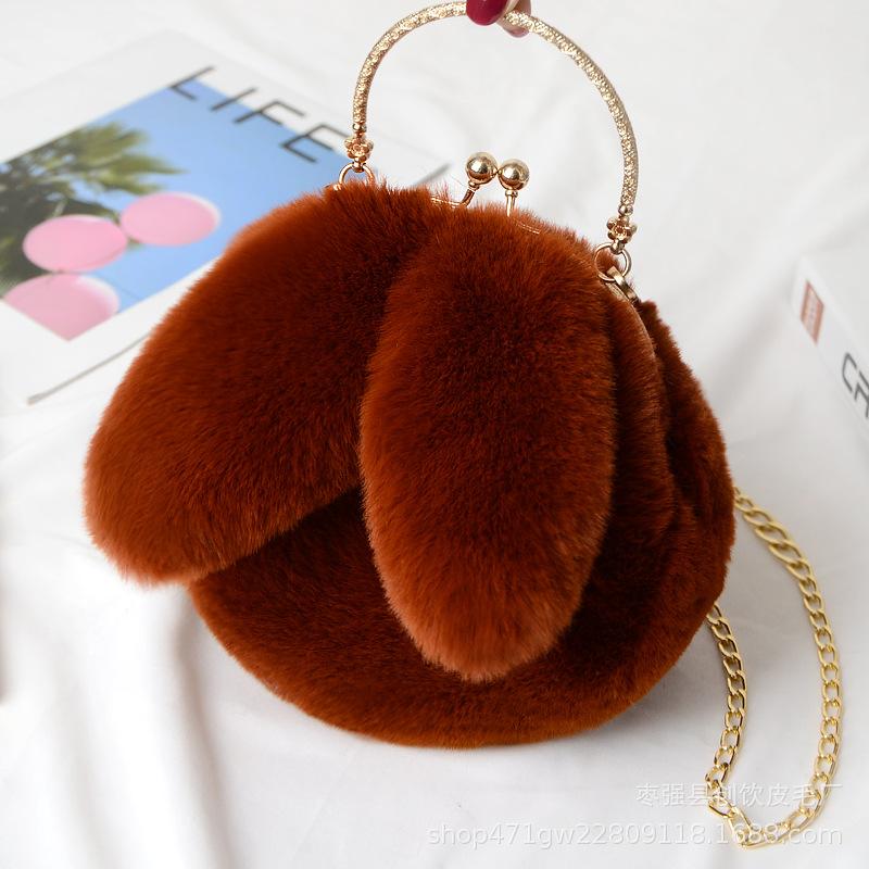 Plush rabbit bag female oblique cross Korean version cute portable fluffy bag autumn and winter new rabbit ear clip bag clip bag