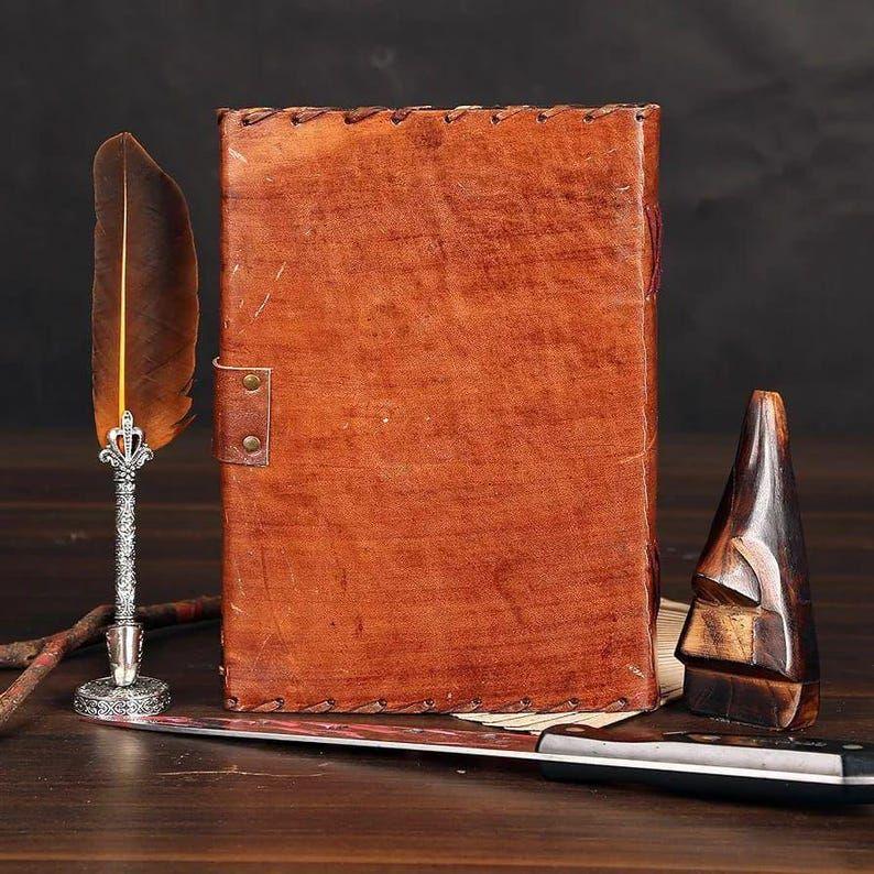 Leather Journal – Mystic Eye diary with embossed design, antique lock & unlined craft pages for writing or sketching.