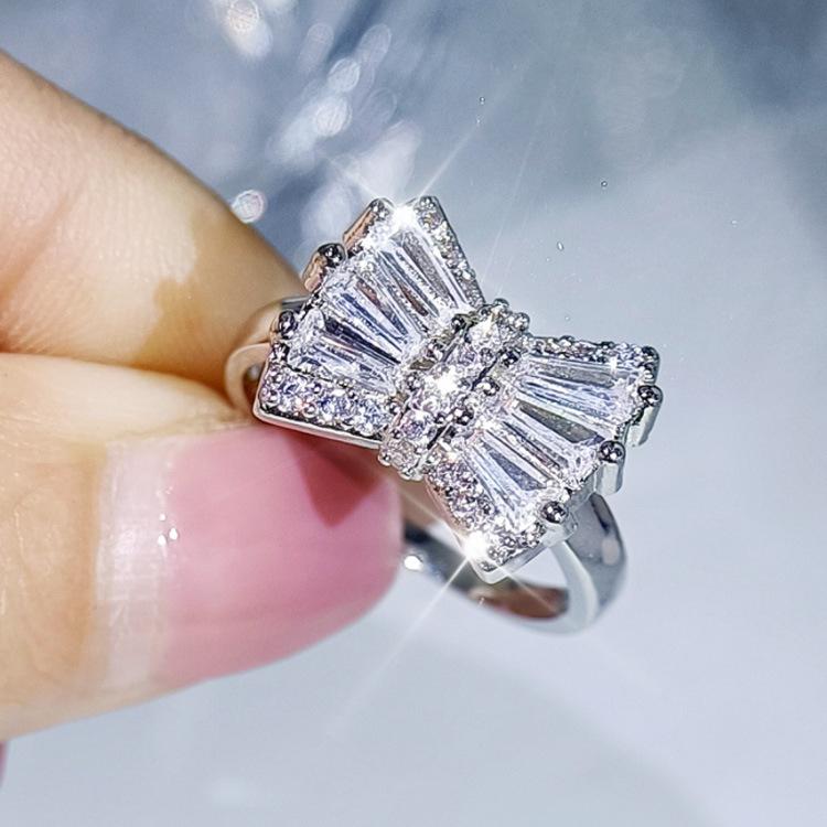 Korean Version Simple Bow Necklace Earrings Three Piece Set Platinum Plated Set with Zirconium Womens Fashion Accessories
