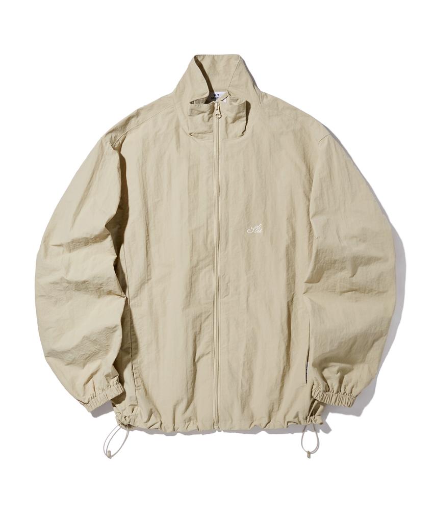 Slit Studio Lettering Windbreaker Jacket Beige