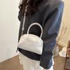 Retro-Texture Bowling Bag: Casual Commute & Niche Design with a Simple, Textured Pillow-Style Shoulder Bag