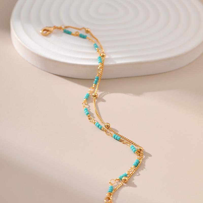 Gold Plated Double Layer Turquoise Color Seed Bead Bracelet With Extension Chain