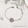 Four-Leaf Clover Enamel Bracelet: Elegant, Fade-Resistant, Versatile, Exquisite Hand Jewelry for Women.