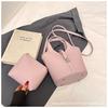 Korean version of the foreign style hand-held bucket bag women's 2025 new niche design mother and child bag commuter shoulder crossbody bag