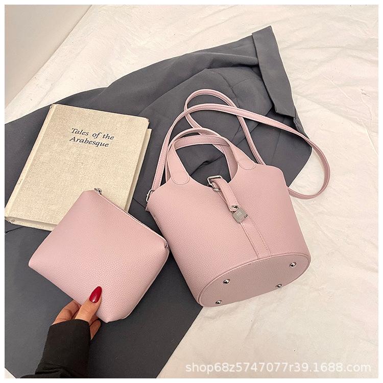 Korean version of the foreign style hand-held bucket bag women's 2025 new niche design mother and child bag commuter shoulder crossbody bag