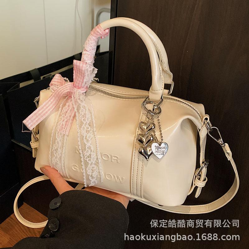 Fashion niche hand carry bowling bag women 2025 new Korean version trend high-end shoulder bag versatile messenger bag
