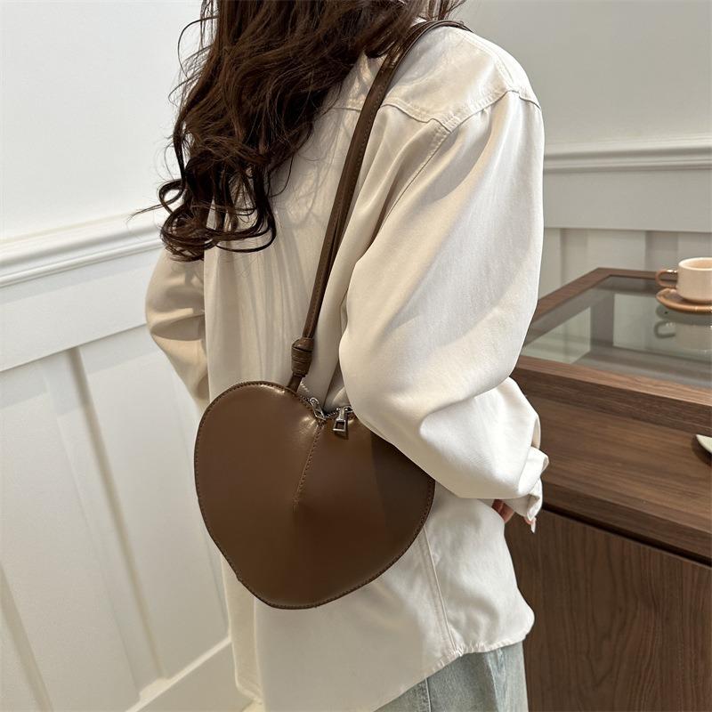 New fashion personality sub-shell love foreign style solid color small peach heart cute personality trendy shoulder messenger women's bag