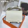 2025 New wide strap geta clog bag leather women's bag commuting versatile one-shoulder crossbody stewardess bag small square bag