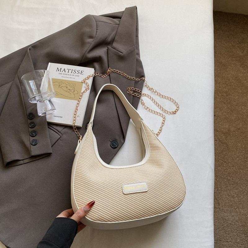 

Модный тренд Сумка подмышку на одно плечо Новый весенний нишевый дизайн Портативная сумка-мессенджер Сумка-пельмень Женщины белый