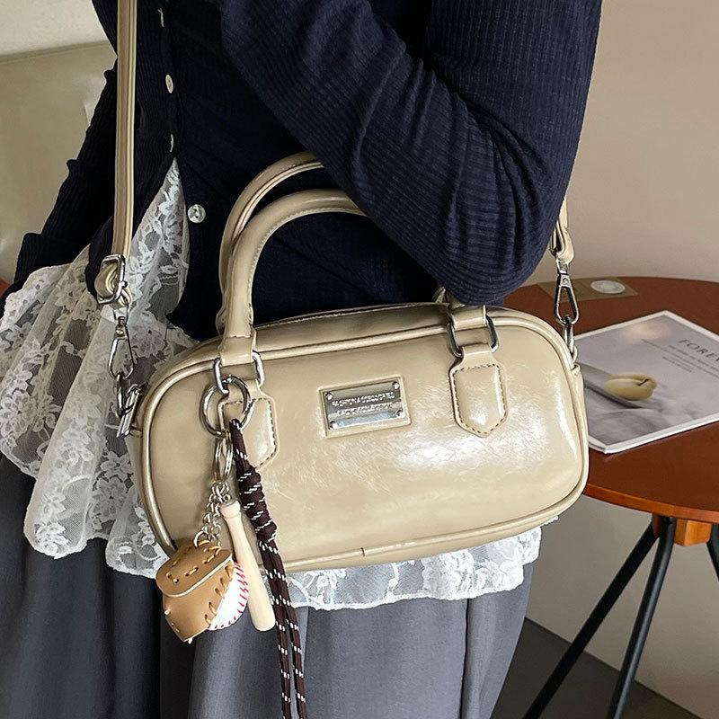 New Korean version niche versatile foreign style portable bowling bag women commute to work advanced sense messenger bag bag