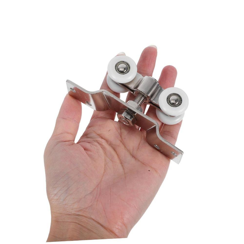 Nerezové závěsné kolečko pro posuvné dveře Tichý váleček Vysoká nosnost Závěsné kolejnicové kolečka Odolné proti povětrnostním vlivům Hladký váleček