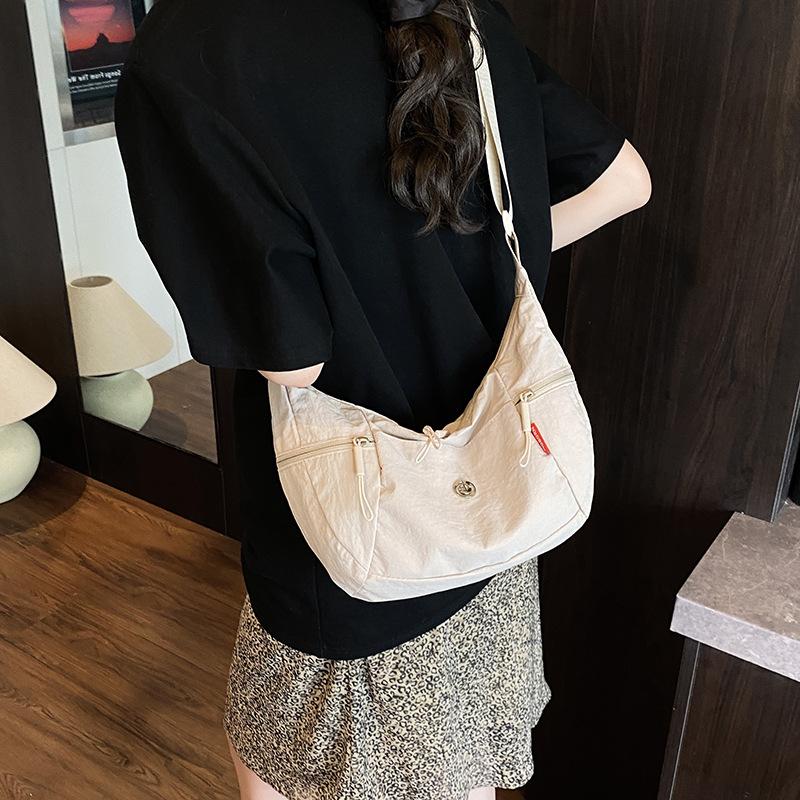 Sommer Canvas-Tasche mit großem Fassungsvermögen Damen neue Knödel-Tasche lässige und leichte Schulter-Umhängetasche