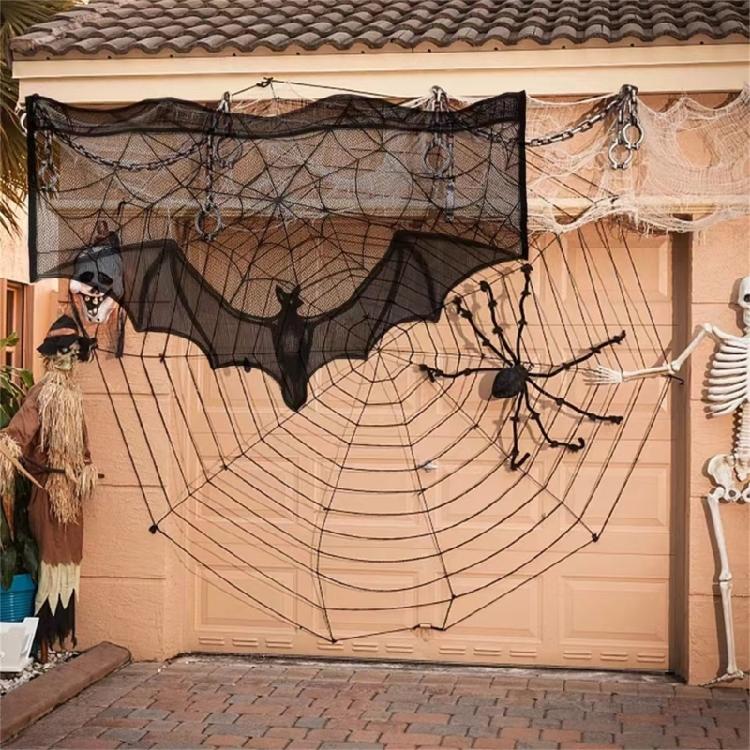 Festliche schwarze Spitzendecke für Kaminumrandung mit Spinnennetz- und Fledermausdetails für Halloween-Feier