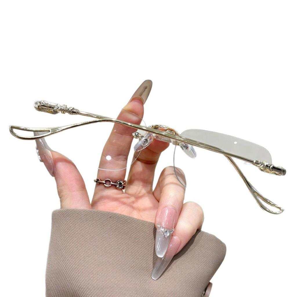 High-End Women's Rimless Blue Light Blocking Glasses - Fashionable Square Frame with Decorative Cut-Edge Design.