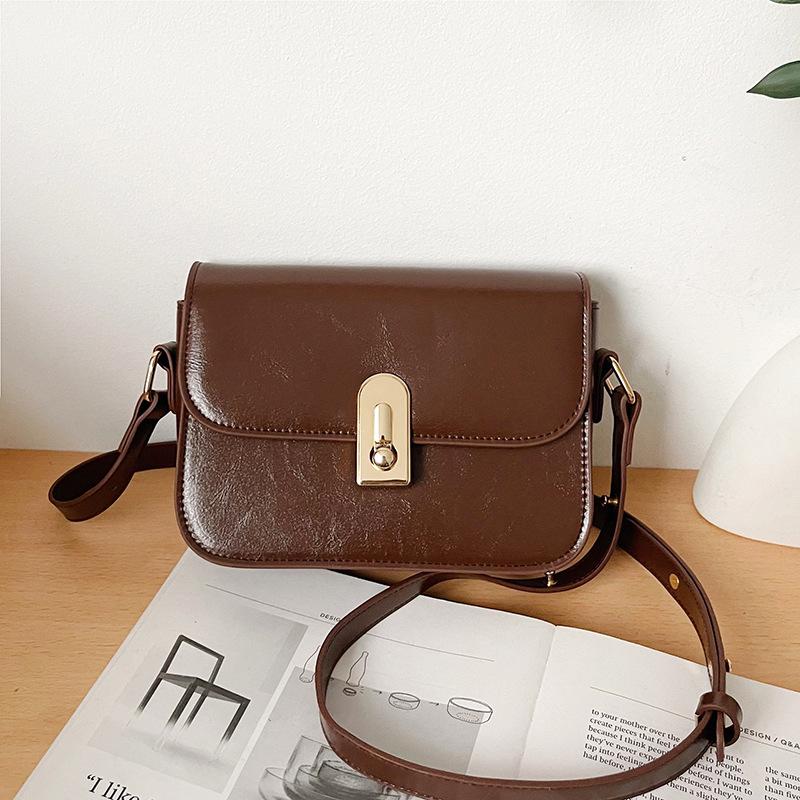 

Spring new shoulder messenger bag fashionable and simple commuter small square bag retro simple versatile women s bag коричневий