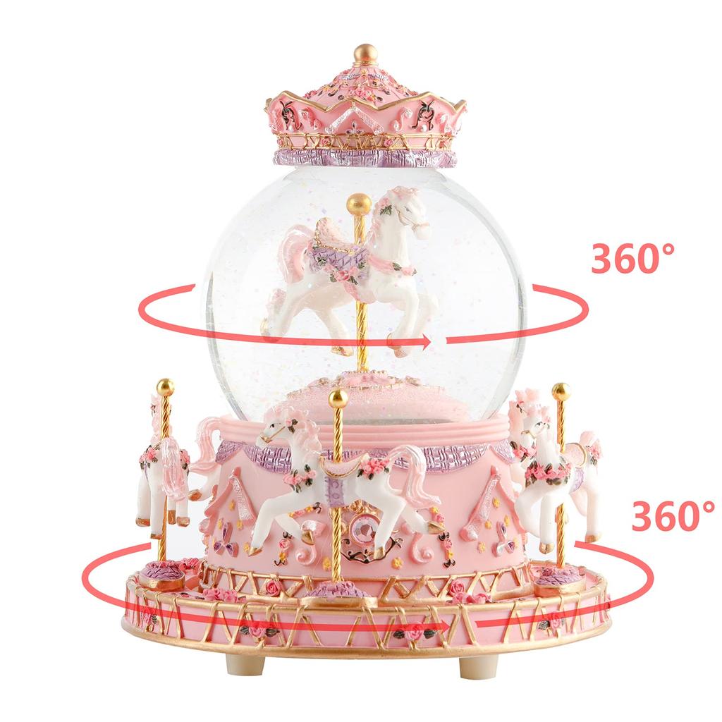 Snow globe music box with colored LED lights, merry-go-round, crystal ball, and automatic snowfall. Popular as a birthday or Christmas gift for girls,