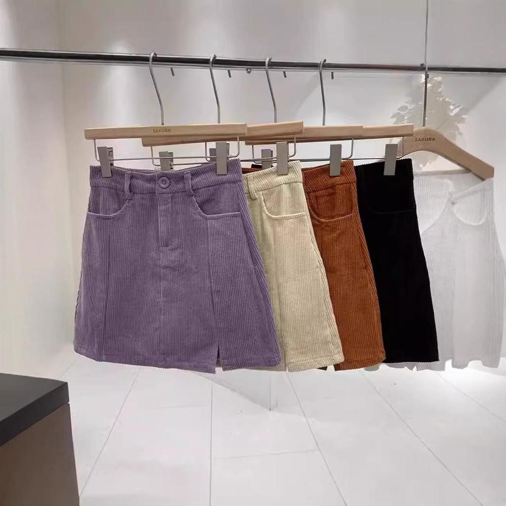 2024 Autumn Women's High-Waisted Corduroy A-Line Mini Skirt with Button, Slit, and Anti-Exposure Design - Korean Style Versatile Bodycon.
