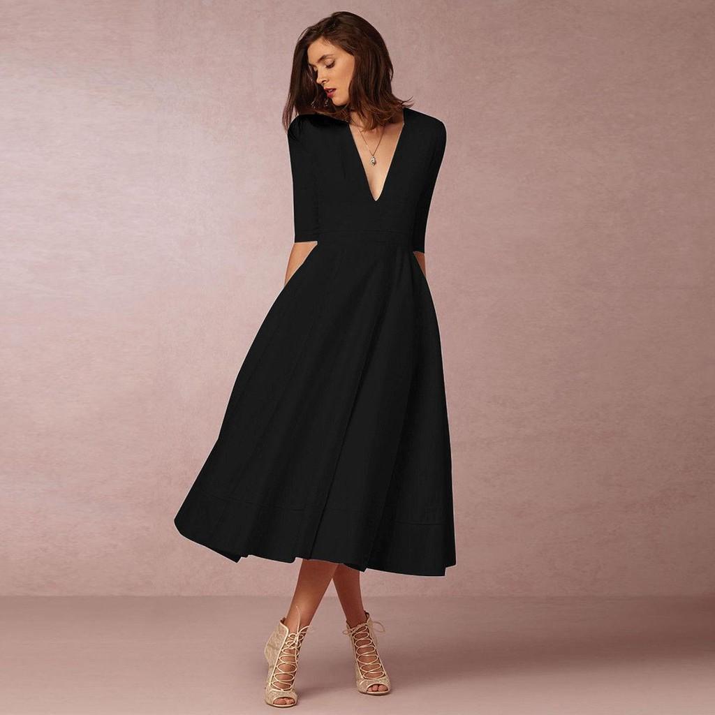 Robe élégante et décontractée en maille pour femme, avec col en V, disponible en plusieurs couleurs.