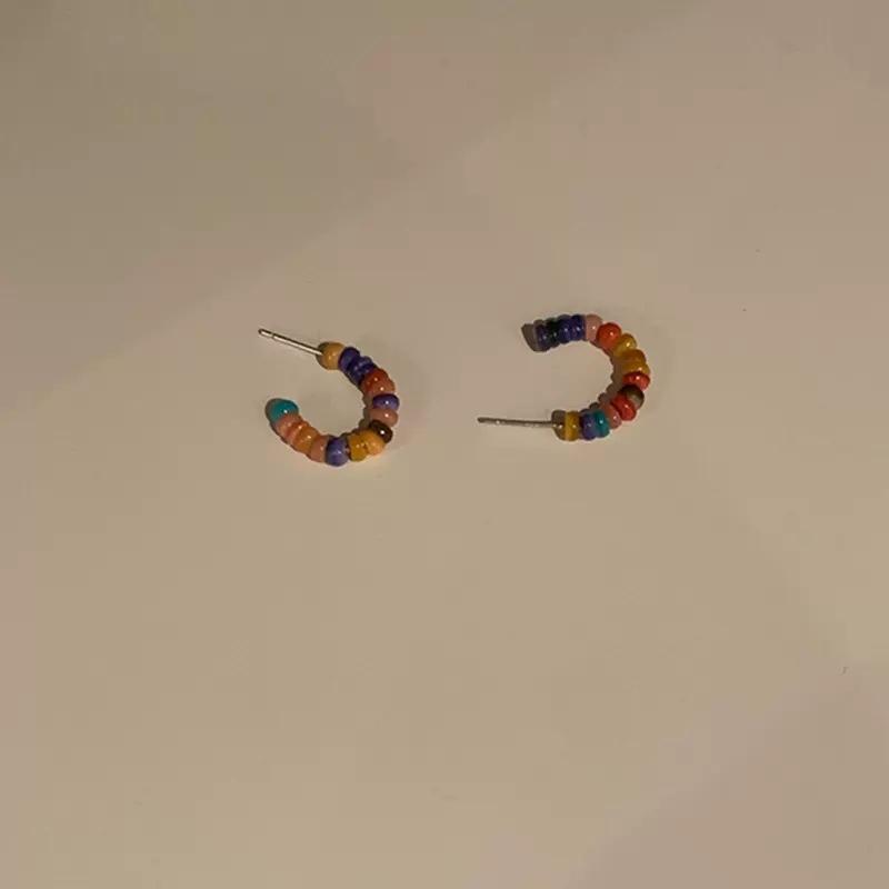 Japan and Korea cute color beaded earrings women's new trendy autumn and winter earrings simple and cold wind ring earrings