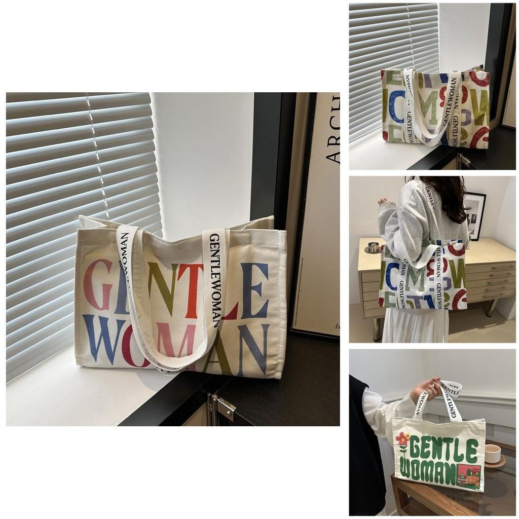 Large Capacity Stylish Canvas Tote Bag With Vibrant Letter Print Design For Everyday Use